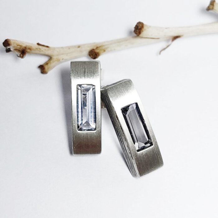 Nordform Rechteckige Ohrstecker Silber Bergkristall Baguetteschliff
