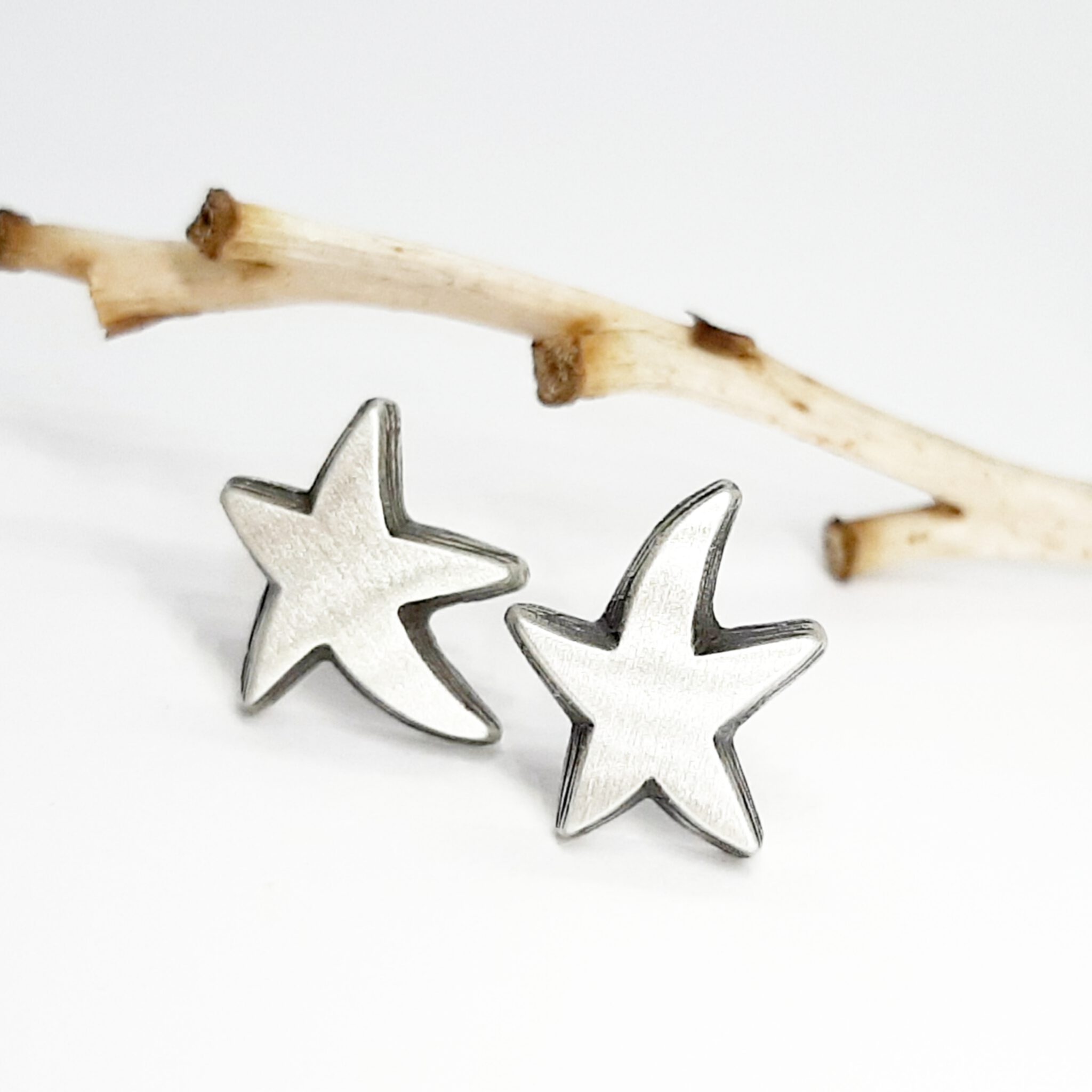 Nordform Sternförmige Ohrstecker Silber Gebürstet