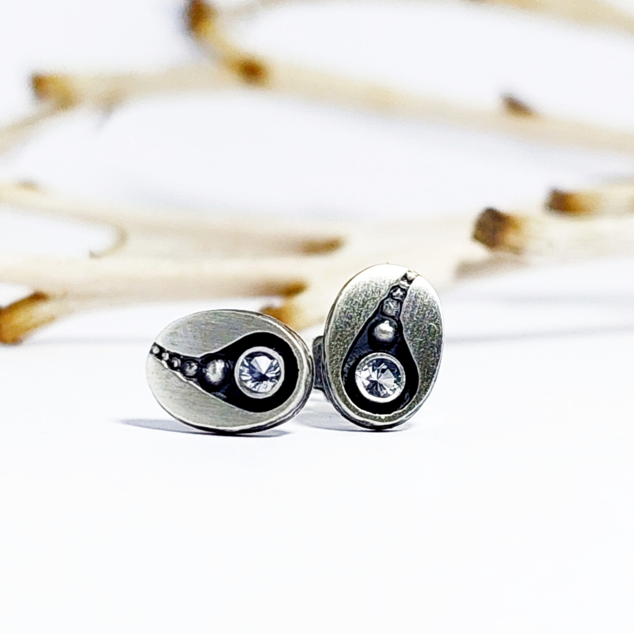 Nordform Ohrstecker Oval (Sonnensystem) Bergkristall Silber